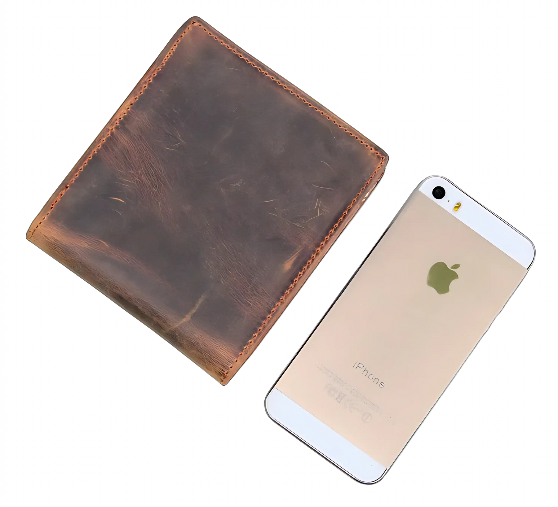 Carteira de couro marrom ao lado de um iPhone dourado