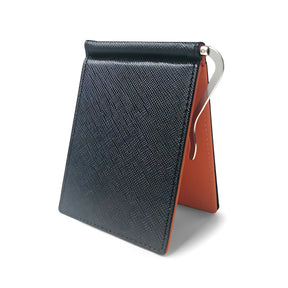 Porta-notas preto com detalhe em laranja, ideal para organização de escritório.
