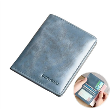 Carteira de couro azul vintage, compacta e com proteção RFID para cartões.