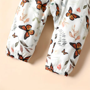 Macacão infantil feminino bebê menina na cor branco com detalhes para o elástico da barra.